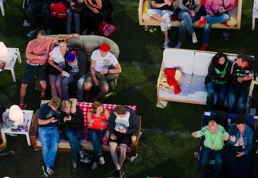 People sit on sofas as they watch the opening game of the 2014 World Cup between Brazil and Croatia, during a public viewing event at the Alte Foersterei stadium in Berlin June 12, 2014. u00e2u20acu201d Reuters pic