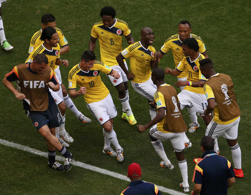 Colombia's James Rodriguez (4th left) celebrates by dancing with his teammates after scoring past Ivory Coast during their 2014 World Cup Group C match at the Brasilia national stadium in Brasilia June 19, 2014. u00e2u20acu201d Reuters pic