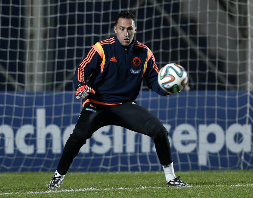 Colombia's goalkeeper David Ospina eyes the ball during warm up before their international friendly football match against Jordan in Buenos Aires June 6, 2014. u00e2u20acu201d Reuters pic