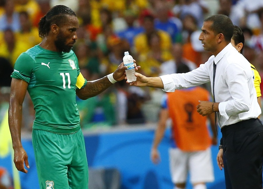 Ivory Coastu00e2u20acu2122s Didier Drogba talks with his teamu00e2u20acu2122s coach Sabri Lamouchi during their 2014 World Cup Group C match against Greece at the Castelao arena in Fortaleza June 24, 2014. u00e2u20acu201d Reuters pic