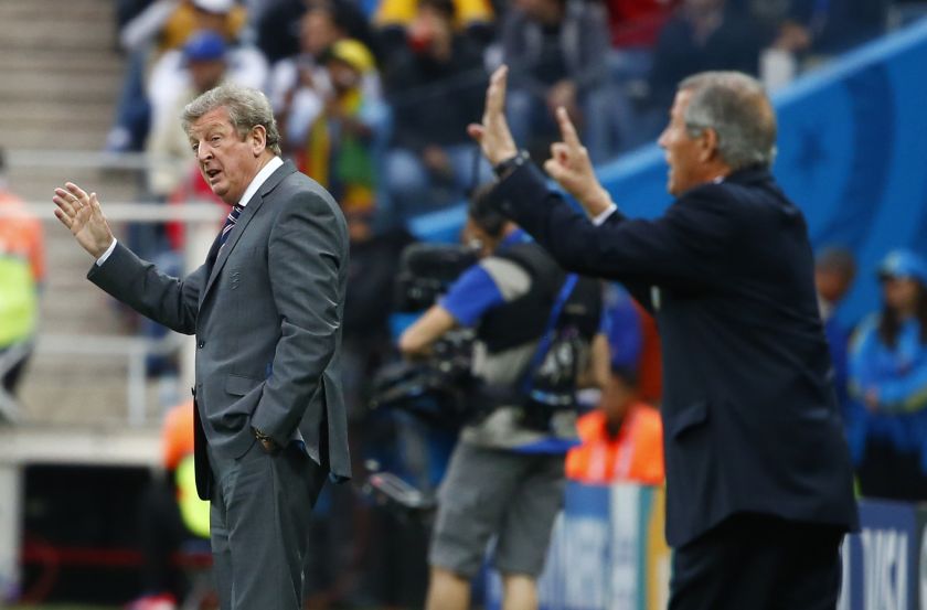 England's coach Roy Hodgson (left) and Uruguay's coach Oscar Tabarez gesture during their 2014 World Cup Group D football match at the Corinthians arena in Sao Paulo June 20, 2014. u00e2u20acu201d Reuters pic