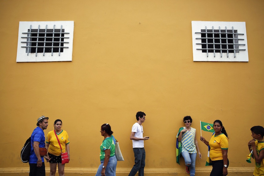 Brazil fans walk in the old part of Recife, after their team's victory against Chile during a 2014 World Cup round of 16 game, June 29, 2014.u00c2u00a0u00e2u20acu201du00c2u00a0Reuters pic