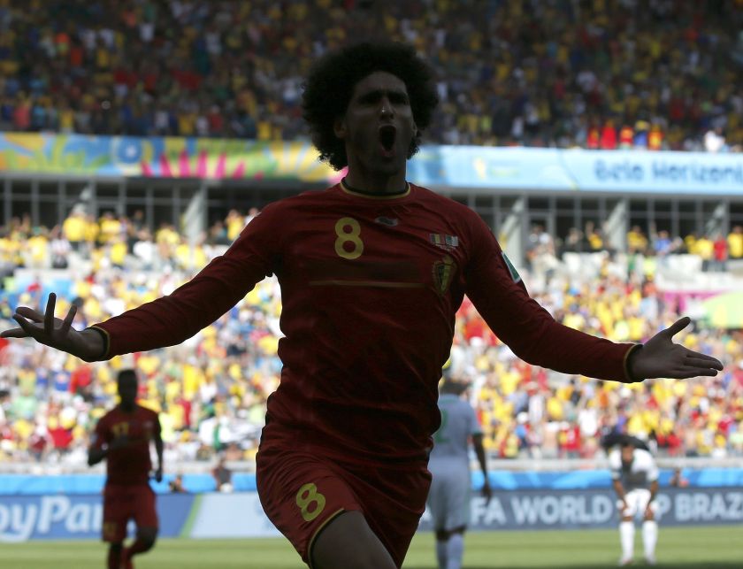 Belgium's Marouane Fellaini celebrates after scoring a goal against Algeria during their 2014 World Cup Group H football match at the Mineirao stadium in Belo Horizonte June 18, 2014. u00e2u20acu201d Reuters pic