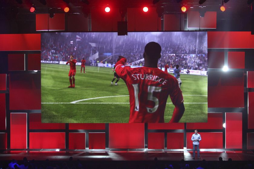 People watch a demonstration of u00e2u20acu02dcFIFA 15u00e2u20acu2122 at the Electronic Arts (EA) World Premiere: E3 2014 Preview press conference at the Shrine Auditorium in Los Angeles, California, June 9, 2014. u00e2u20acu2022 Reuters pic