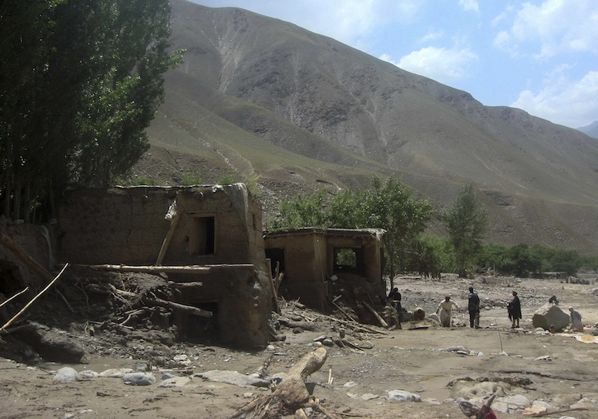 Afghan villagers search at the site after a flashflood in the Gozargah-e Noor district of Baghlan province June 7, 2014. u00e2u20acu201du00c2u00a0Reuters pic