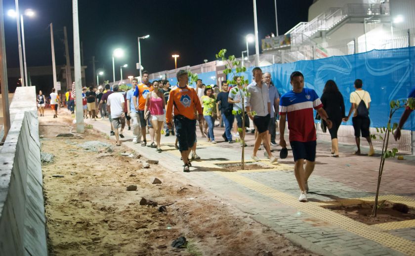 Football fans walk along an unfinished sidewalk outside the Dunas arena as they arrive to watch Ghana and the United States play a Group G match for the 2014 World Cup, in Natal June 16, 2014. u00e2u20acu2022 Reuters pic  