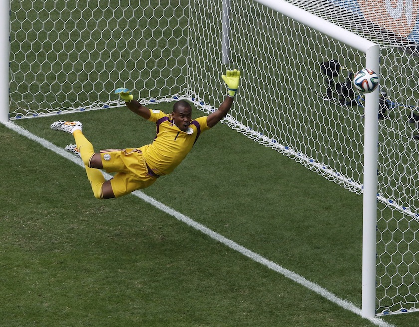 Nigeria's goalkeeper Vincent Enyeama jumps to make a save on a shot at goal by France's Paul Pogba during their 2014 World Cup round of 16 game at the Brasilia national stadium in Brasilia July 1, 2014.u00c2u00a0u00e2u20acu201du00c2u00a0Reuters pic