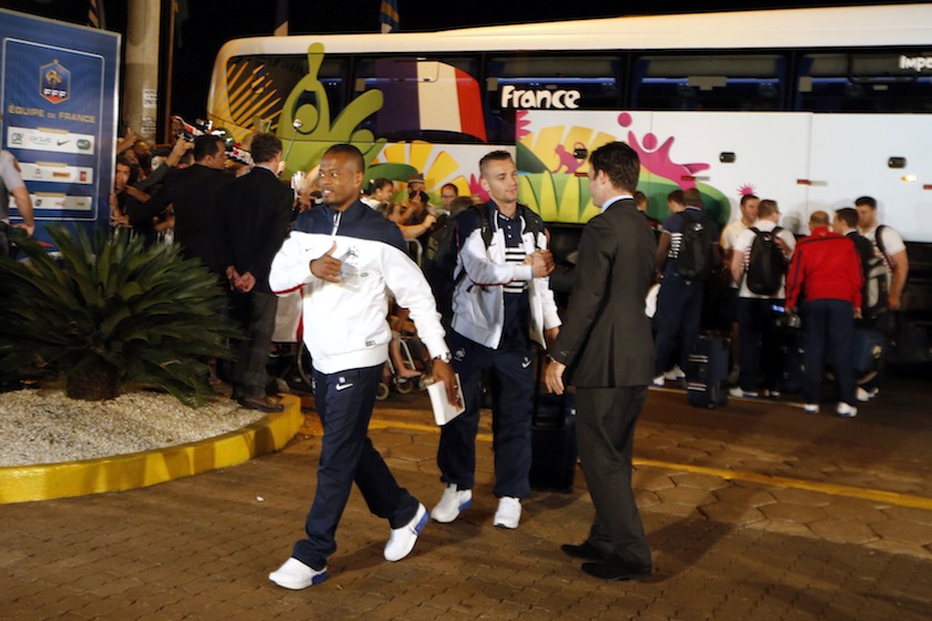 France's national team players Patrice Evra (left) and Mathieu Debuchy (centre) arrive at their hotel, ahead of the 2014 World Cup, at Ribeirao Preto June 9, 2014. u00e2u20acu201d Reuters pic