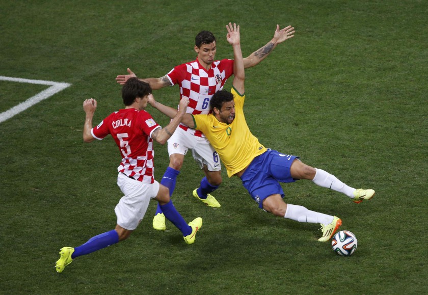 Brazilu00e2u20acu2122s Fred is fouled by Croatiau00e2u20acu2122s Dejan Lovren inside the penalty area during their World Cup opening match at the Corinthians arena in Sao Paulo June 12, 2014. u00e2u20acu201d Reuters pic