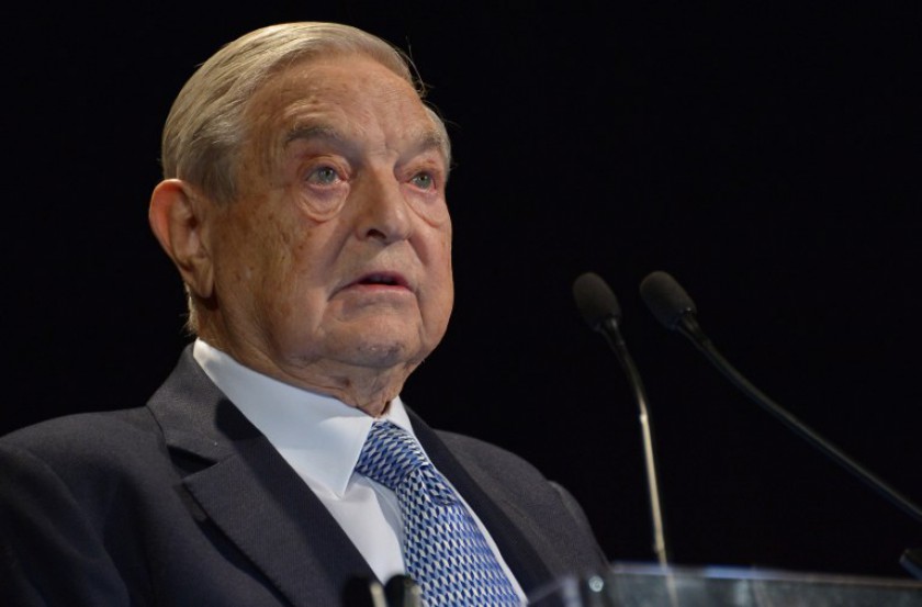 File picture shows billionaire George Soros speaking at the Annual Freedom Award Benefit hosted by the International Rescue Committee at the Waldorf-Astoria hotel on November 6, 2013 in New York City. u00e2u20acu201d AFP pic