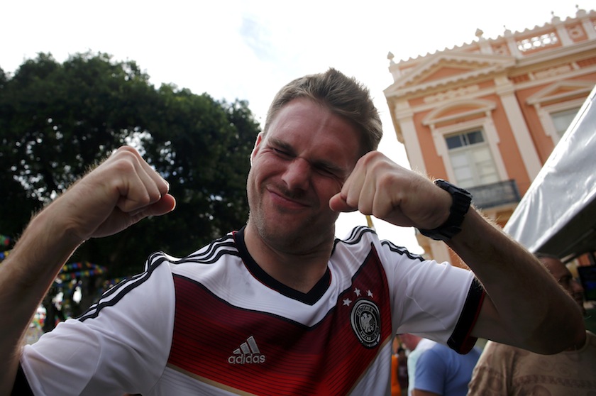 Germany supporter Clemens Dreesbach, from Bonn, gestures as he poses for a picture at the Fan Zone in Pelourinho neighbourhood ahead of Germany's 2014 World Cup match against Portugal in Salvador, June 14, 2014.u00c2u00a0u00e2u20acu201du00c2u00a0Reuters pic