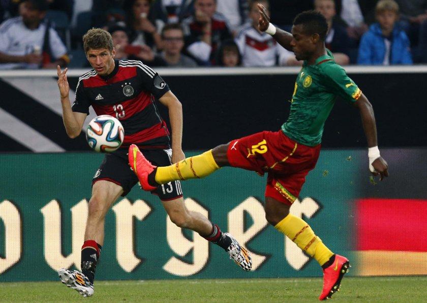 Germanyu00e2u20acu2122s Thomas Mueller (left) challenges Cameroonu00e2u20acu2122s Henri Bedimo during their international friendly match in Moenchengladbach, June 1, 2014. u00e2u20acu201d Reuters pic