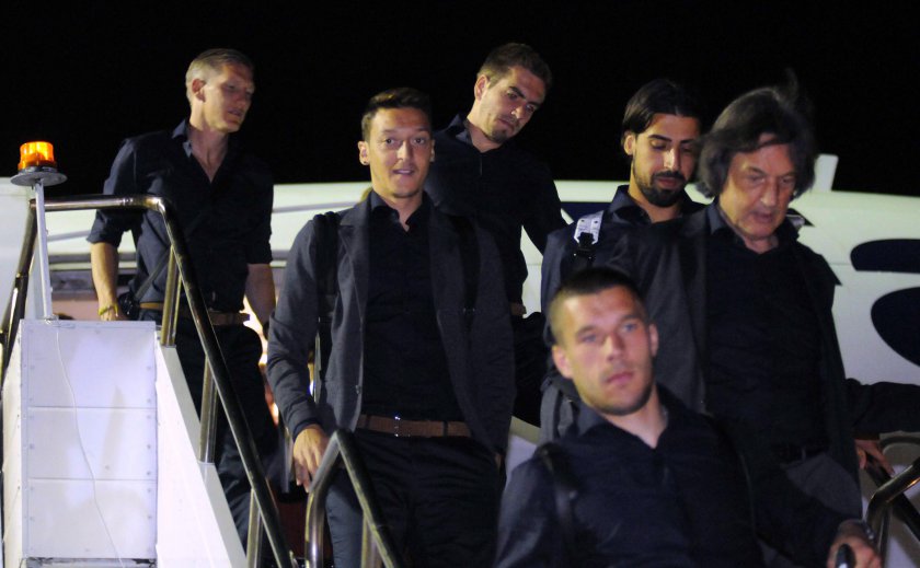 Germanyu00e2u20acu2122s Mesut Ozil (centre) walks with team mates down the steps from their plane upon arrival in Salvador, Brazil, June 8, 2014. u00e2u20acu201d Reuters pic