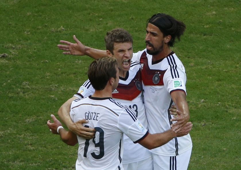 Germany's Thomas Mueller celebrates with Mario Goetze and Sami Khedira (right) after scoring a goal during the 2014 World Cup Group G match between Germany and Portugal at the Fonte Nova arena in Salvador June 16, 2014. u00e2u20acu2022 Reuters pic  