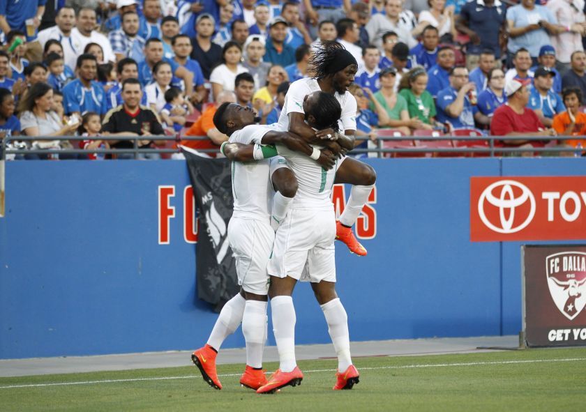 (from left) Ivory Coast's Aurier Serge, Gervinho and Didier Drogba celebrate Gervinho's goal against El Salvador in their international friendly soccer match, ahead of the 2014 World Cup, in Frisco, Texas June 4, 2014. u00e2u20acu201d Reuters