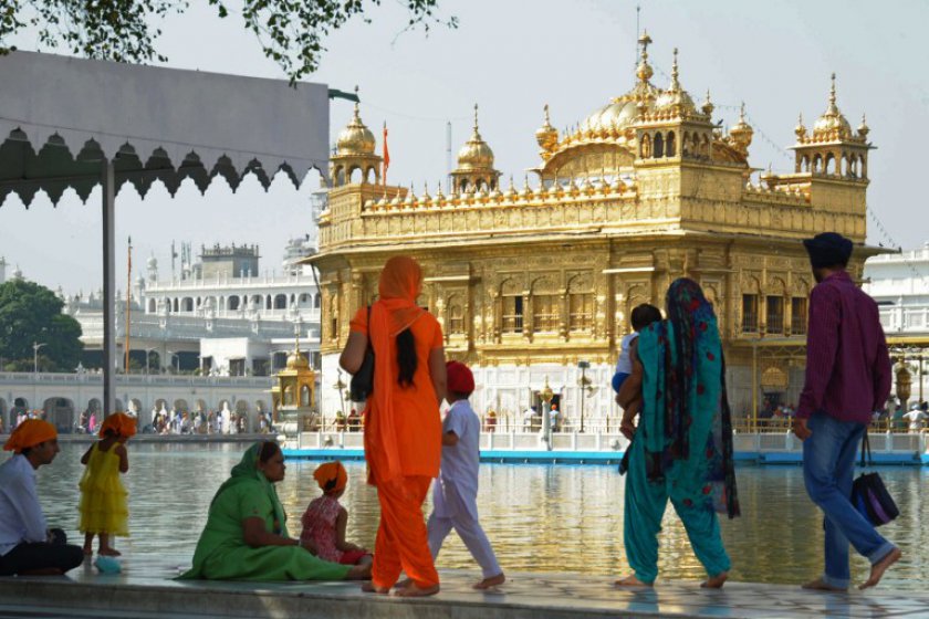 In a picture taken on May 29, 2014, Sikh devotees visit the compounds of the Golden Temple in Amritsar, Punjab, India. u00e2u20acu201d AFP pic