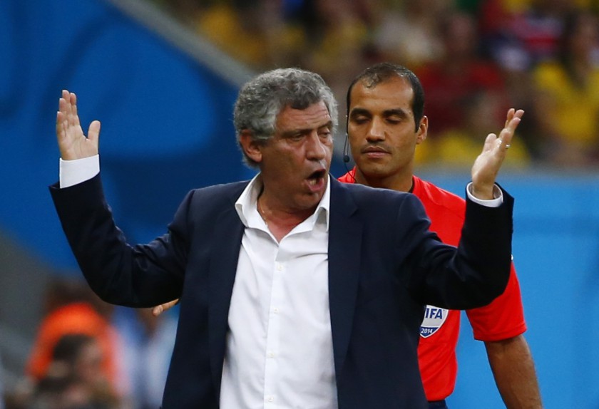 Greeceu00e2u20acu2122s coach Fernando Santos gestures in front of fourth official Nawaf Shukralla of Bahrain during their World Cup round of 16 game against Costa Rica in Recife June 29, 2014. u00e2u20acu201d Reuters pic