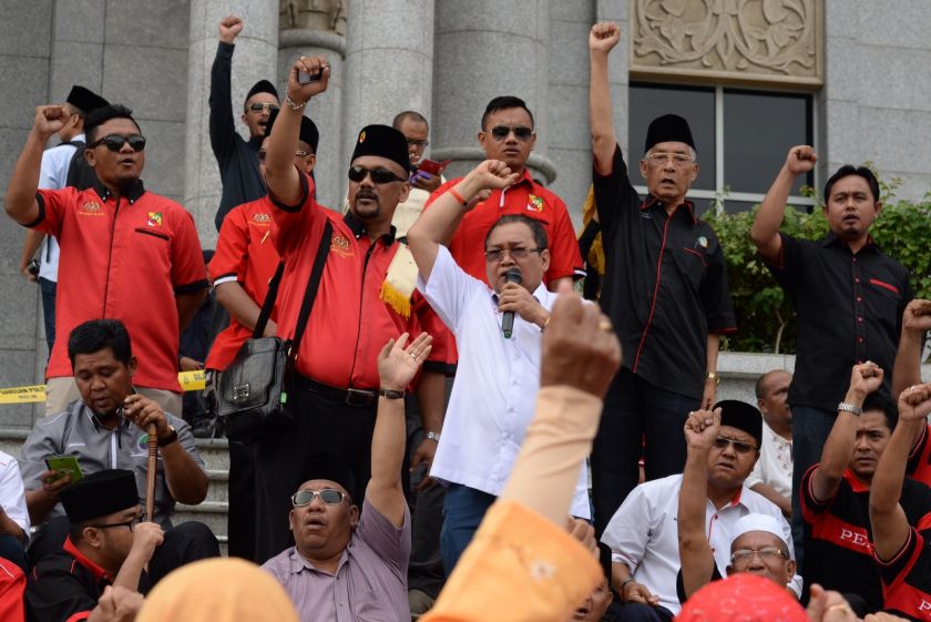 Ibrahim Ali giving a speech after the Federal Court turned down the appeal by the Catholic Church to overturn the decision made by a lower court banning the use of the word 'Allah' in the Herald, June 23, 2014. u00e2u20acu201d Picture by Saw Siow Feng