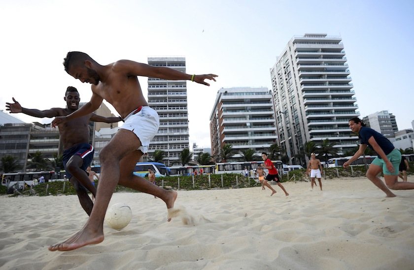 Men play football on the iconic Ipanema beach in Rio de Janeiro June 9, 2014. u00e2u20acu201du00c2u00a0Reuters pic