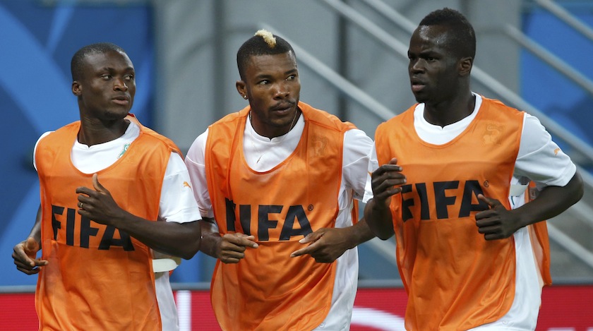 Ivory Coast's national  team players (from left) Constant Djakpa, Geoffroy Serey Die and Ismael Diomande run during a training session at the Pernambuco Arena stadium in Recife June 13, 2014.u00c2u00a0u00e2u20acu201d Reuters pic