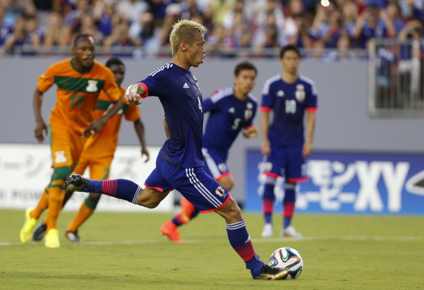 Japanu00e2u20acu2122s Keisuke Honda (centre) scores a penalty kick against Zambia during their international friendly match, ahead of the 2014 World Cup, in Tampa, Florida June 6, 2014. u00e2u20acu201d Reuters pic