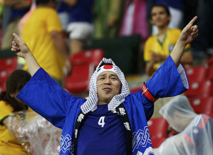 A fan of Japan cheers ahead of their 2014 World Cup Group C match against Ivory Coast at the Pernambuco arena in Recife June 15, 2014. u00e2u20acu201d Reuters pic