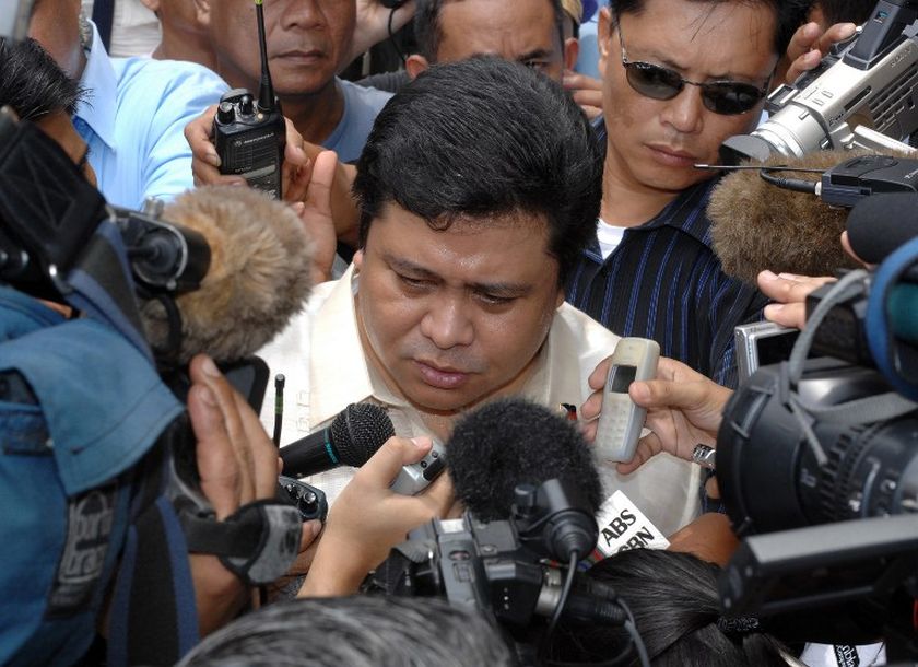 Philippine Senator Jose Ejercito Estrada is interviewed by journalists outside the Sandiganbayan anti-graft court after he was acquitted of corruption in Quezon, 12 September 2007. u00e2u20acu201d AFP pic