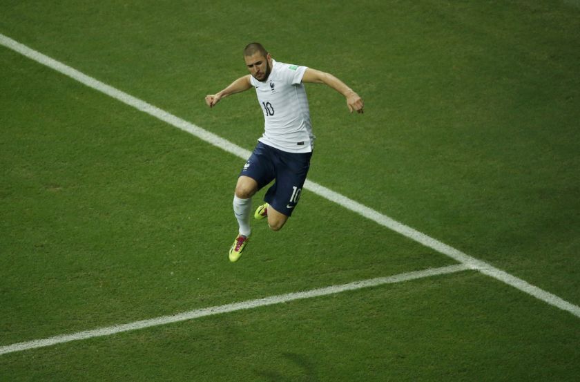 France's Karim Benzema celebrates after scoring a goal during the 2014 World Cup Group E football match between Switzerland and France at the Fonte Nova arena in Salvador June 21, 2014. u00e2u20acu201d Reuters pi