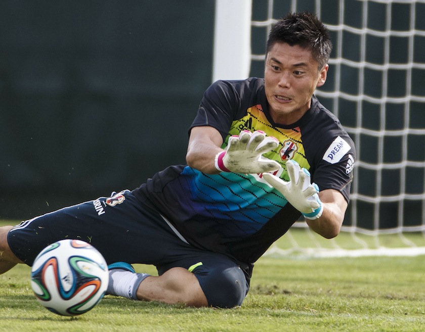 Japan's national team goal keeper Eiji Kawashima dives for a ball during a training session in Clearwater, Florida May 31, 2014. u00e2u20acu201du00c2u00a0Reuters pic