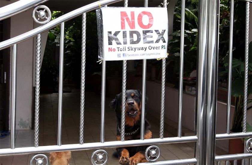 File picture of a No Kidex poster is seen suspended in front of a house in Petaling Jaya. u00e2u20acu201d Picture by Yusof Mat Isa