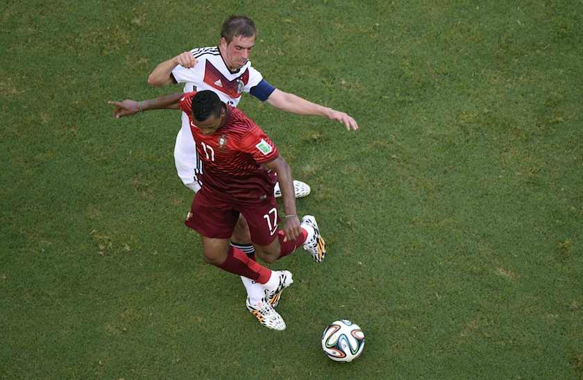 Germanyu00e2u20acu2122s Philipp Lahm fights for the ball with Portugalu00e2u20acu2122s Nani during their 2014 World Cup Group G match at the Fonte Nova arena in Salvador June 16, 2014. u00e2u20acu201d Reuters pic