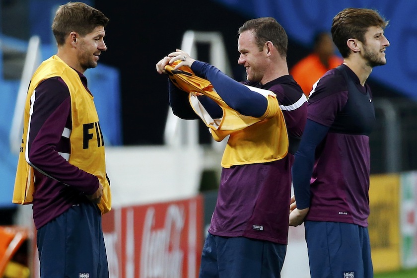 England's national team captain Steven Gerrard (left), players Wayne Rooney (centre) and Adam Lallana arrive for their final practice one day before the match against Uruguay, in Sao Paulo June 19, 2014.u00c2u00a0u00e2u20acu201d Reuters pic