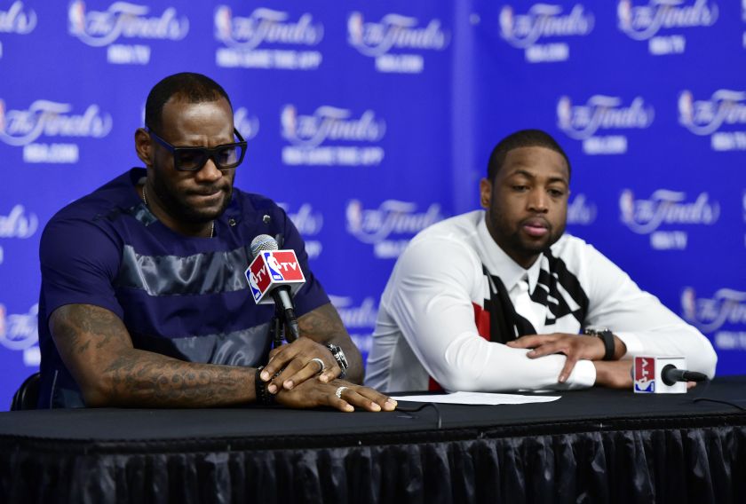 Miami Heat forward LeBron James (6) and guard Dwyane Wade (3) speak during a press conference after game five of the 2014 NBA Finals at AT&T Center, San Antonion, June 15, 2014. u00e2u20acu201d Picture by Bob Donnan-USA TODAY Sports