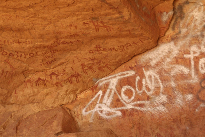 Vandalised rock art is pictured at Tadrart Acacus, in Ghat May 30, 2014. u00e2u20acu201d Reuters pic