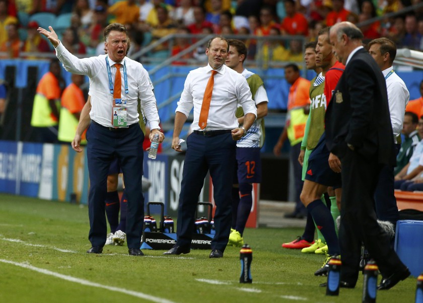 Netherlands coach Louis van Gaal (left) and assistant coach Danny Blind react during their World Cup Group B match against Spain in Salvador, June 13, 2014. u00e2u20acu201d Reuters pic