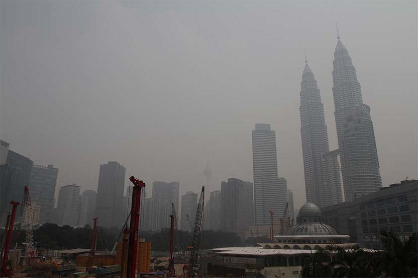 Kuala Lumpur City Centre is seen through the haze in Kuala Lumpur June 24, 2014. u00e2u20acu201d Picture by Yusof Mat Isa