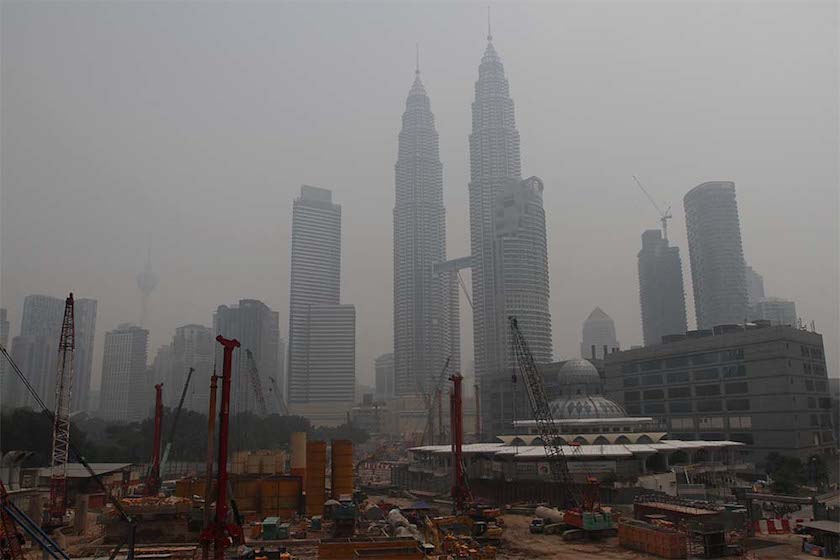 Kuala Lumpur City Centre is seen through the haze in Kuala Lumpur June 24, 2014. u00e2u20acu201d Picture by Yusof Mat Isa
