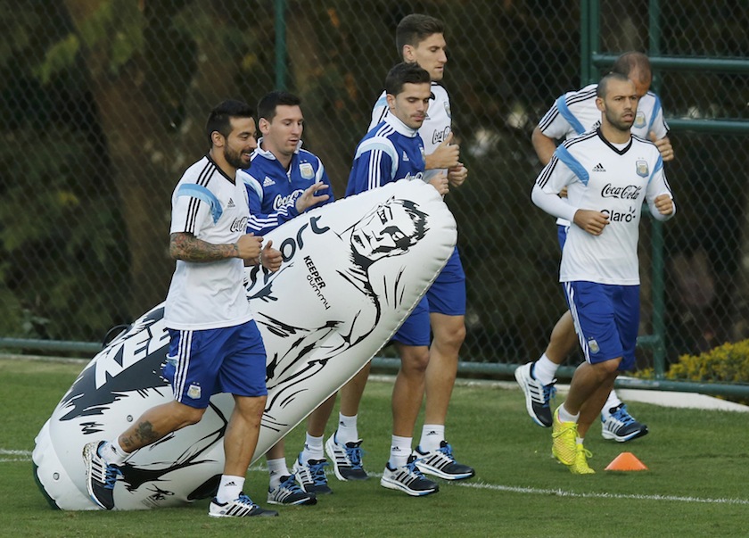 Argentina's national players Ezequiel Lavezzi (left), Lionel Messi (second from left) and teammates attend a training session at Ciudad do Galo grounds in Vespasiano, outside Belo Horizonte, June 27, 2014. u00e2u20acu201d Reuters pic