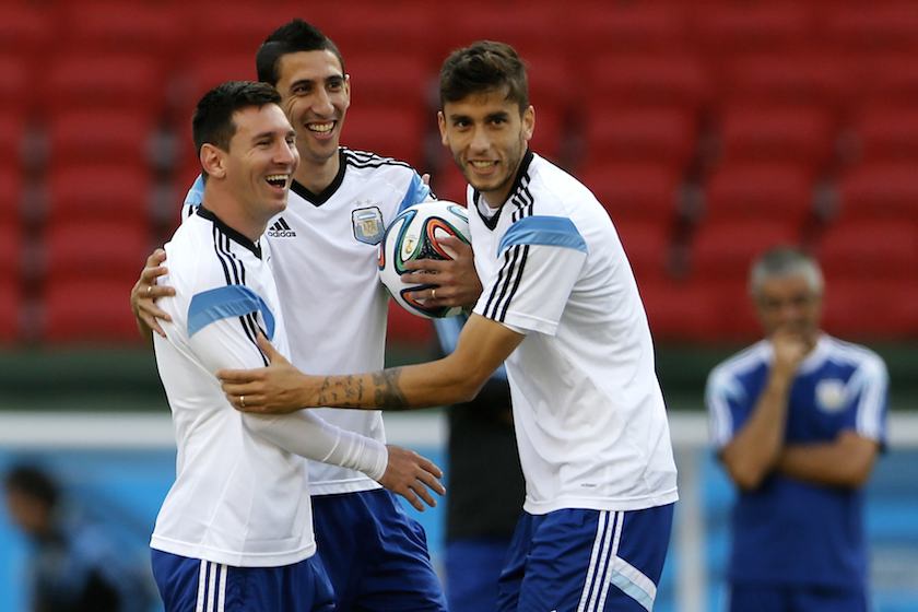 Argentinau00e2u20acu2122s national players (from left) Lionel Messi, Angel di Maria and Ricardo Alvarez smile during a training session at the Beira-Rio stadium in Porto Alegre June 24, 2014. u00e2u20acu201d Reuters pic