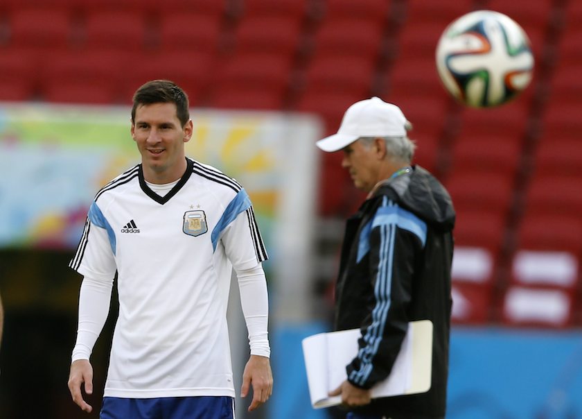 Argentinau00e2u20acu2122s national player Lionel Messi (left) and head coach Alejandro Sabella attend a training session at the Beira-Rio stadium in Porto Alegre June 24, 2014. u00e2u20acu201d Reuters pic