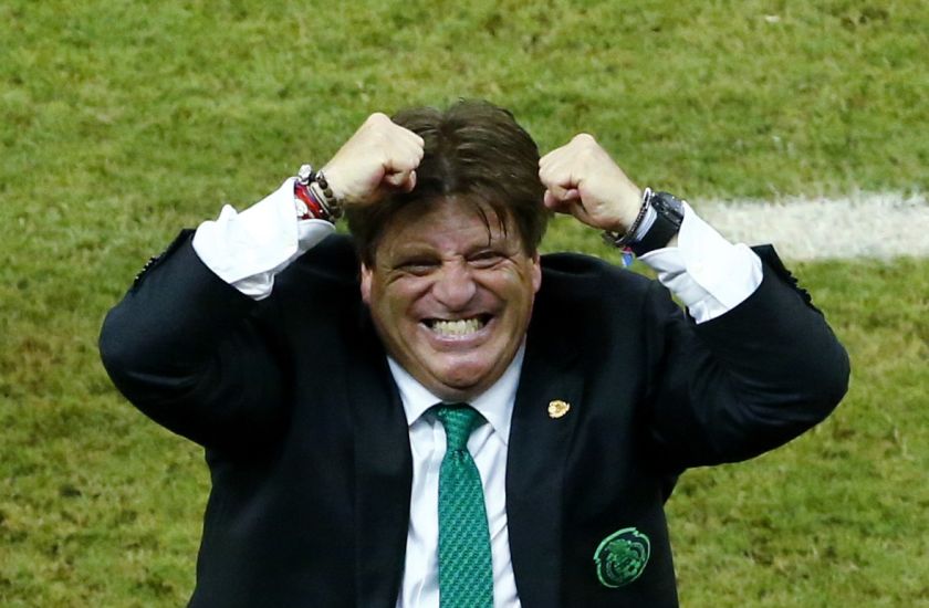 Mexico's coach Miguel Herrera celebrates after Javier Hernandez (unseen) scores the team's third goal during their 2014 World Cup Group A football match against Croatia at the Pernambuco Arena in Recife June 23, 2014. u00e2u20acu201d Reuters pic
