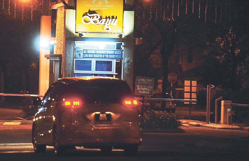 The entrance leading to one of the houses where several smuggled Indonesian women were held captive. u00e2u20acu201d Picture by Arif Kartono