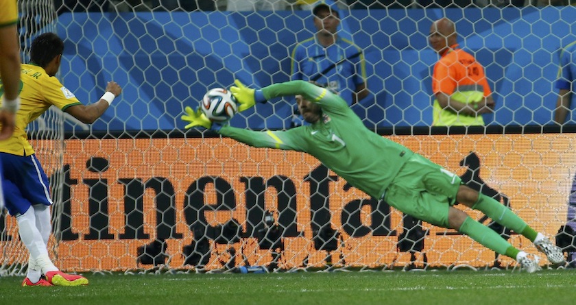 Croatia's Stipe Pletikosa almost saves ball shot by Brazil's Neymar during their 2014 World Cup opening match at the Corinthians arena in Sao Paulo June 12, 2014.u00c2u00a0u00e2u20acu201d Reuters pic