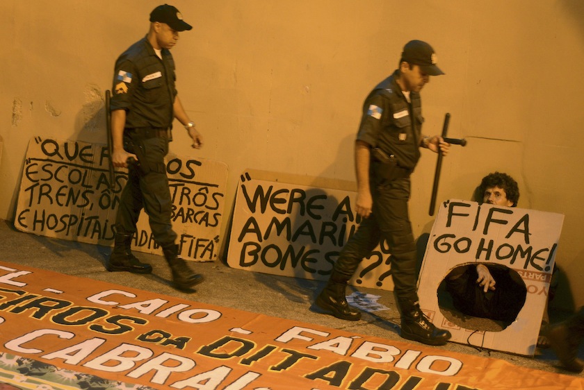 Brazilian police patrol as protesters against the World Cup sit outside Maracana stadium during the 2014 World Cup round of 16 game Uruguay vs Colombia, in Rio de Janeiro June 29, 2014. u00e2u20acu201d Reuters pic