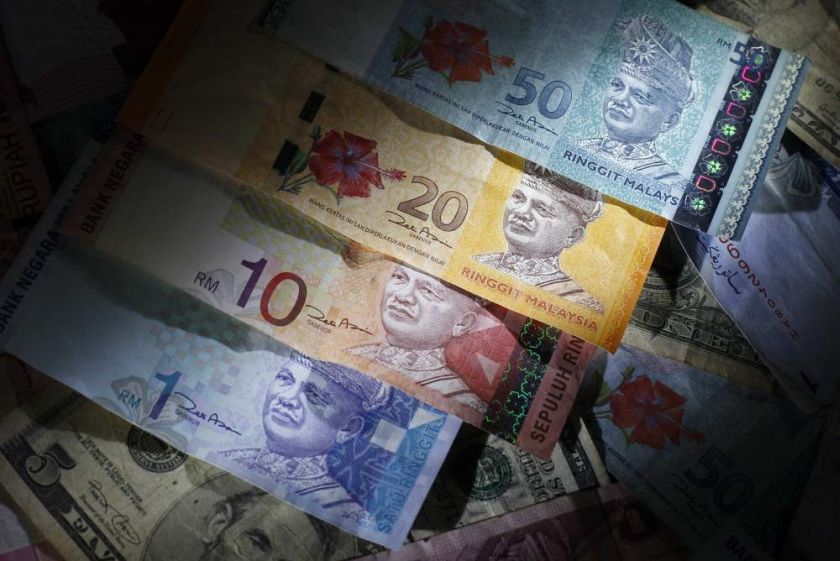 According to data compiled by Bloomberg, the ringgit fell 0.1 per cent to 3.2110 per dollar and is little changed this week. u00e2u20acu2022 File pic