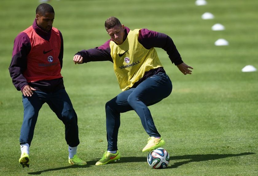 England's midfielder Ross Barkley (right) controls the ball during a training session in Almancil, southern Portugal, on May 21, 2014. u00e2u20acu201d AFP pic