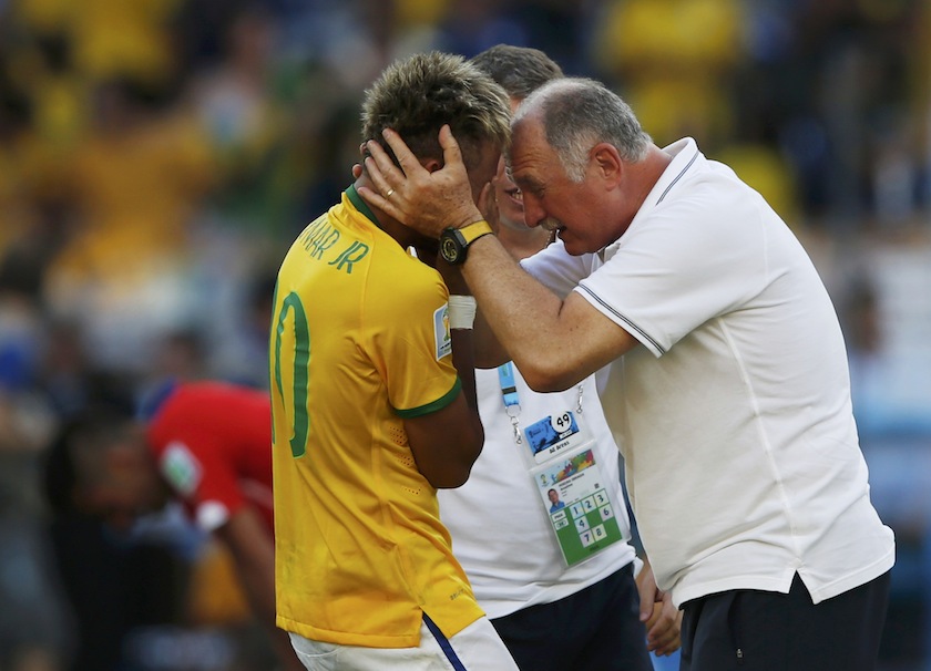 Brazil's Neymar is congratulated by coach Luiz Felipe Scolari after they won their penalty shootout against Chile in their 2014 World Cup round of 16 game at the Mineirao stadium in Belo Horizonte June 29, 2014.u00c2u00a0u00e2u20acu201d Reuters pic