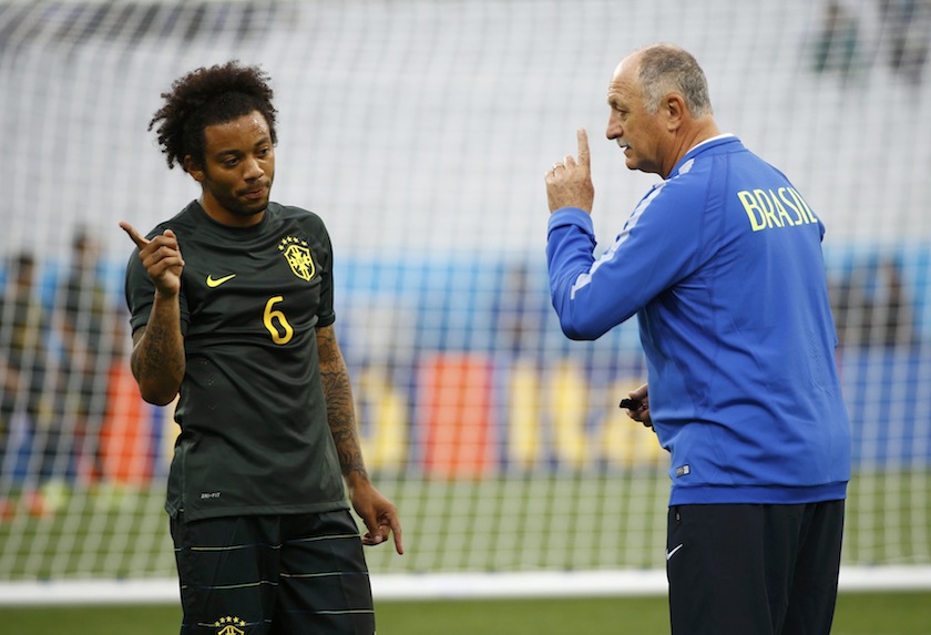 Brazil's national team coach Luiz Felipe Scolari (right) talks to his defender Marcelo during his team's final practice at the Arena de Sao Paulo in Sao Paulo June 11, 2014. u00e2u20acu201du00c2u00a0Reuters pic