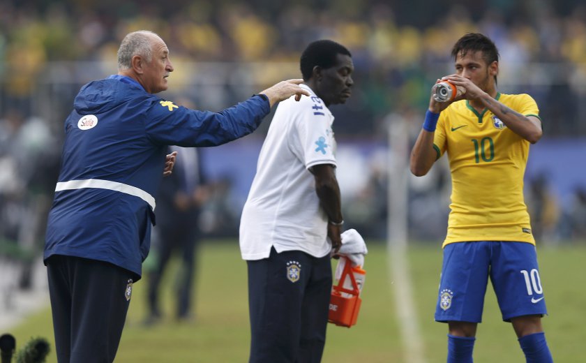 Brazilu00e2u20acu2122s coach Luiz Felipe Scolari (left) instructs player Neymar during their international friendly match against Serbia ahead of the 2014 World Cup in Morumbi stadium in Sao Paulo, June 6, 2014. u00e2u20acu201d Reuters pic