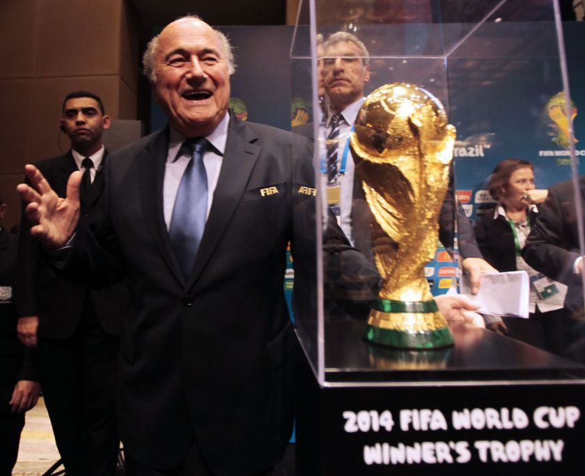 FIFA President Sepp Blatter gestures next to the World Cup trophy after a media conference in Sao Paulo June 5, 2014. u00e2u20acu2022 Reuters pic